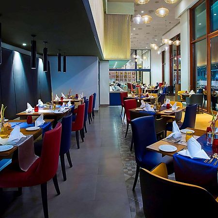 Grand Mercure Mysore - An Accor Brand Extérieur photo The interior of the restaurant